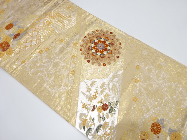 華紋に秋草・枝梅模様織出し袋帯